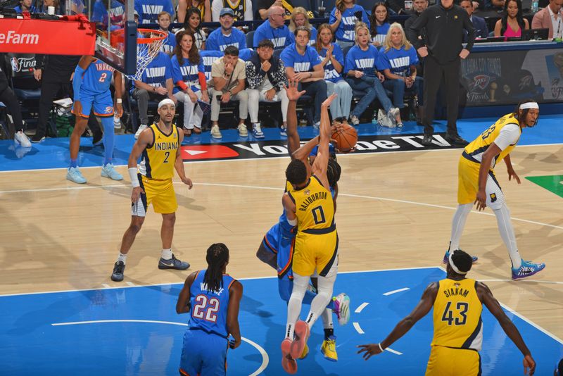 OKLAHOMA CITY, OK - JUNE 8: Tyrese Haliburton #0 of the Indiana Pacers blocks the basket during the game against the Oklahoma City Thunder during Game Two of the 2025 NBA Finals on June 8, 2025 at Paycom Center in Oklahoma City, Oklahoma. NOTE TO USER: User expressly acknowledges and agrees that, by downloading and or using this photograph, User is consenting to the terms and conditions of the Getty Images License Agreement. Mandatory Copyright Notice: Copyright 2025 NBAE (Photo by Jesse D. Garrabrant/NBAE via Getty Images)