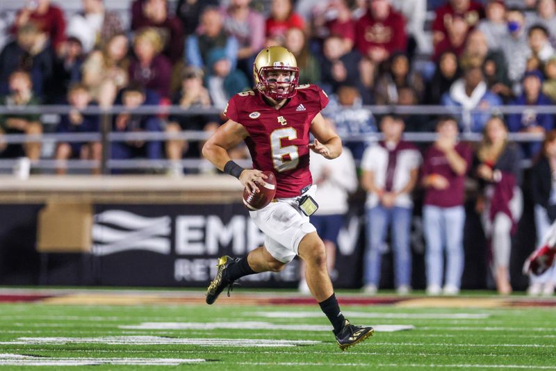 Oct 16, 2021; Chestnut Hill, Massachusetts, USA; Boston College Eagles quarterback Dennis Grosel (6) runs the ball during the second half against the North Carolina State Wolfpack at Alumni Stadium. Mandatory Credit: Paul Rutherford-USA TODAY Sports