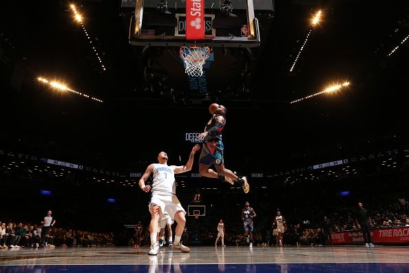 BROOKLYN, NY - DECEMBER 2: Dennis Smith Jr. #4 of the Brooklyn Nets dunks the ball during the game against the Orlando Magic on December 2, 2023 at Barclays Center in Brooklyn, New York. NOTE TO USER: User expressly acknowledges and agrees that, by downloading and or using this Photograph, user is consenting to the terms and conditions of the Getty Images License Agreement. Mandatory Copyright Notice: Copyright 2023 NBAE (Photo by Nathaniel S. Butler/NBAE via Getty Images)