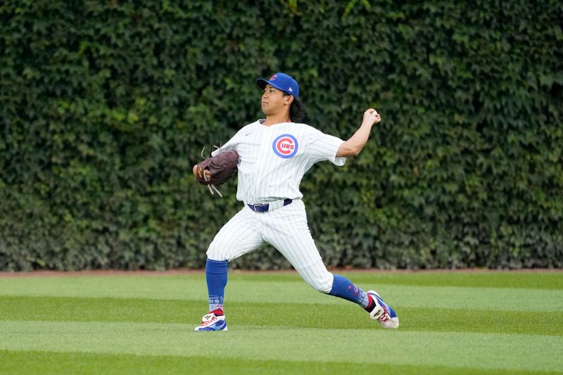 Aug 6, 2024; Chicago, Illinois, USA; Chicago Cubs pitcher Shota Imanaga (18) warms up before the game against the Minnesota Twins at Wrigley Field. Mandatory Credit: David Banks-USA TODAY Sports