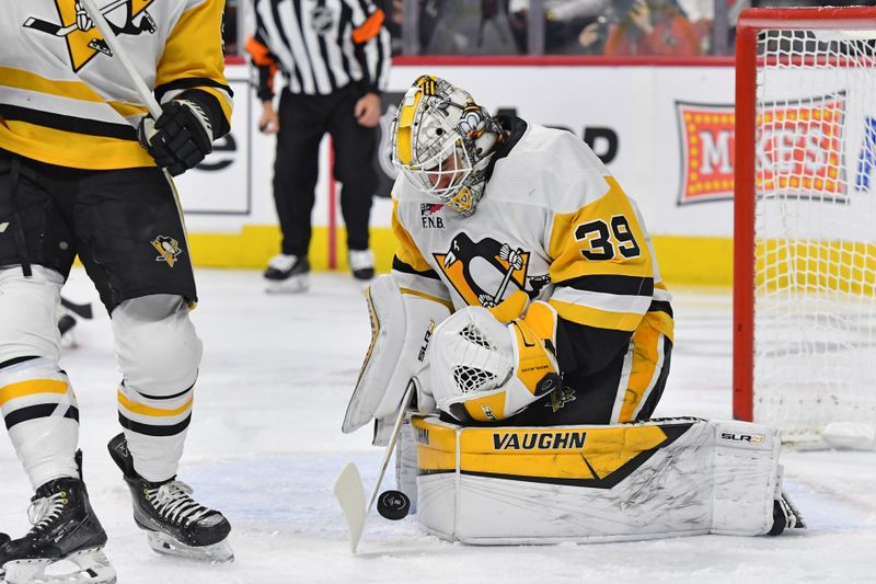 Jan 8, 2024; Philadelphia, Pennsylvania, USA; Pittsburgh Penguins goaltender Alex Nedeljkovic (39) makes a save against the Philadelphia Flyers during the first period at Wells Fargo Center. Mandatory Credit: Eric Hartline-USA TODAY Sports