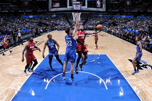 ORLANDO, FL - DECEMBER 20: Caleb Martin #16 of the Miami Heat drives to the basket during the game against the Orlando Magic on December 20, 2023 at the Kia Center in Orlando, Florida. NOTE TO USER: User expressly acknowledges and agrees that, by downloading and or using this photograph, User is consenting to the terms and conditions of the Getty Images License Agreement. Mandatory Copyright Notice: Copyright 2023 NBAE (Photo by Fernando Medina/NBAE via Getty Images)