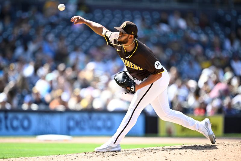 Mar 26, 2024; San Diego, California, USA; San Diego Padres relief pitcher Randy Vasquez (98) throws a pitch against the Seattle Mariners during the seventh inning at Petco Park. Mandatory Credit: Orlando Ramirez-USA TODAY Sports