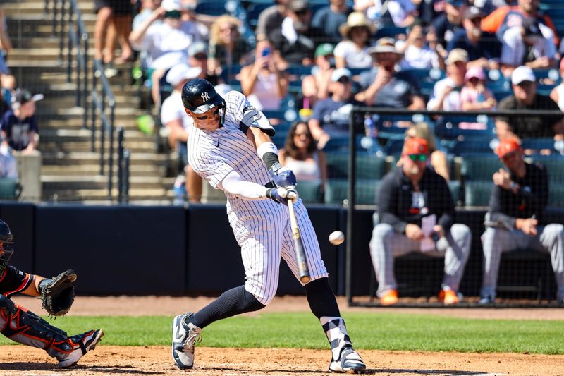 Feb 21, 2026; Tampa, Florida, USA; New York Yankees outfielder Aaron Judge (99) hits a home run against the Detroit Tigers during the third inning in a Spring Training game at George M. Steinbrenner Field. Mandatory Credit: Morgan Tencza-Imagn Images