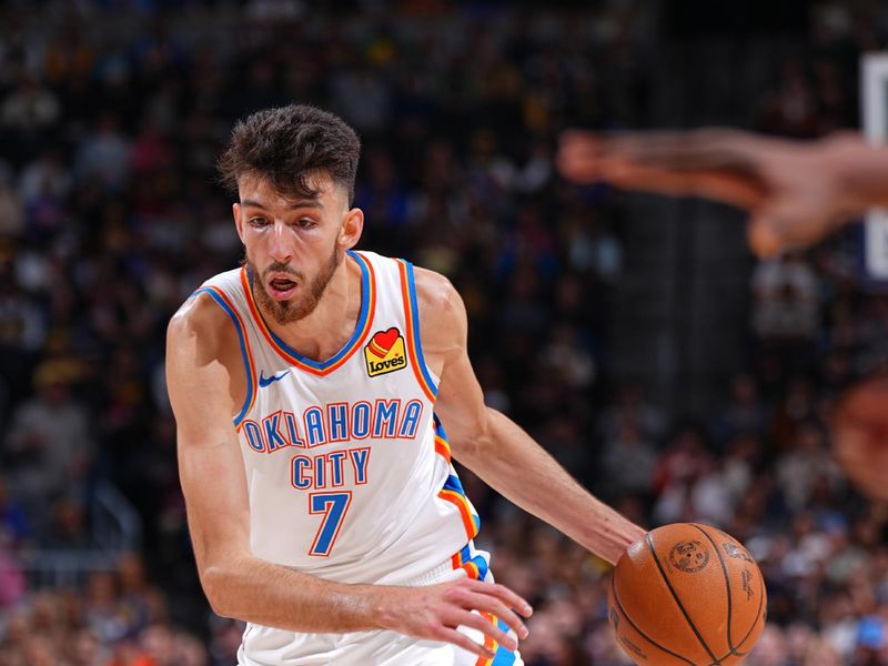 DENVER, CO - NOVEMBER 6: Chet Holmgren #7 of the Oklahoma City Thunder dribbles the ball during the game against the Denver Nuggets on November 6, 2024 at Ball Arena in Denver, Colorado. NOTE TO USER: User expressly acknowledges and agrees that, by downloading and/or using this Photograph, user is consenting to the terms and conditions of the Getty Images License Agreement. Mandatory Copyright Notice: Copyright 2024 NBAE (Photo by Garrett Ellwood/NBAE via Getty Images)