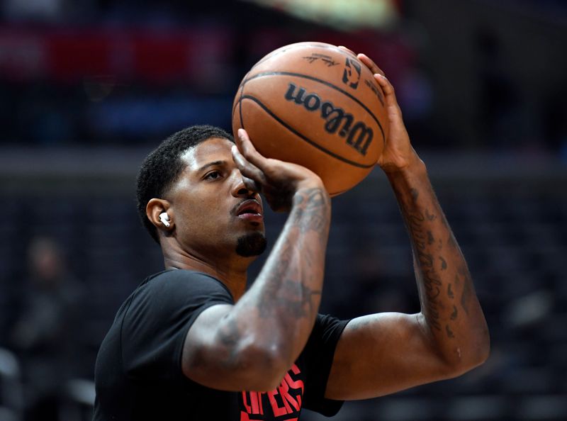 LOS ANGELES, CA - MARCH 08: Paul George #13 of the Los Angeles Clippers warms up prior to the start of the game against Toronto Raptors at Crypto.com Arena on March 8, 2023 in Los Angeles, California. NOTE TO USER: User expressly acknowledges and agrees that, by downloading and or using this photograph, User is consenting to the terms and conditions of the Getty Images License Agreement. (Photo by Kevork Djansezian/Getty Images)