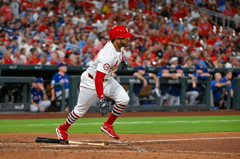 Jul 30, 2024; St. Louis, Missouri, USA;  St. Louis Cardinals pinch hitter Tommy Pham (29) hits a grand slam home run against the Texas Rangers during the fifth inning at Busch Stadium. Mandatory Credit: Jeff Curry-USA TODAY Sports