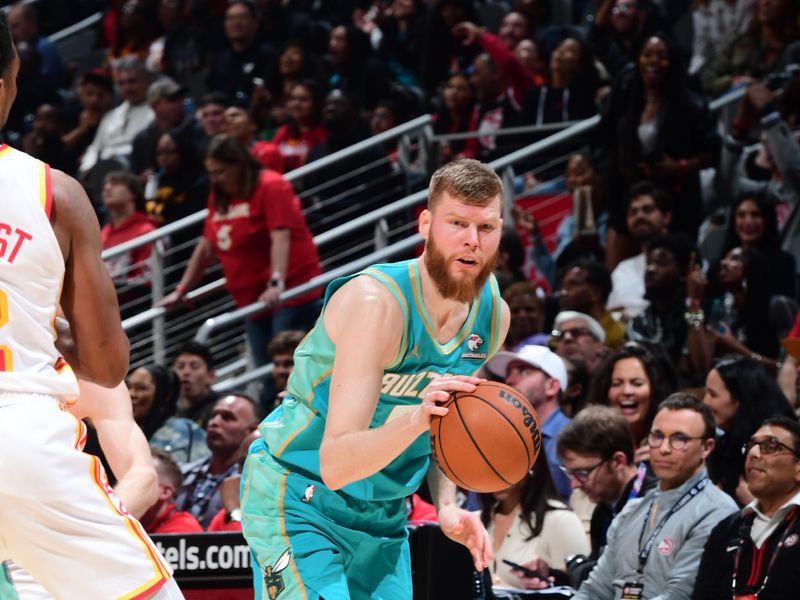 ATLANTA, GA - MARCH 23: Davis Bertans #9 of the Charlotte Hornets dribbles the ball during the game against the Atlanta Hawks on March 23, 2024 at State Farm Arena in Atlanta, Georgia.  NOTE TO USER: User expressly acknowledges and agrees that, by downloading and/or using this Photograph, user is consenting to the terms and conditions of the Getty Images License Agreement. Mandatory Copyright Notice: Copyright 2024 NBAE (Photo by Scott Cunningham/NBAE via Getty Images)