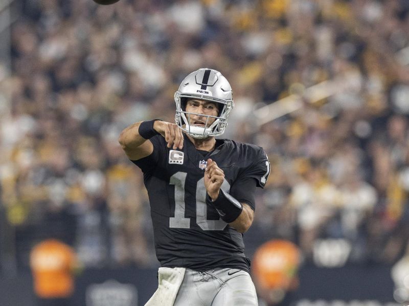 Las Vegas Raiders quarterback Jimmy Garoppolo (10) passes the ball against the Pittsburgh Steelers in an NFL football game, Sunday, Sept. 24, 2023, in Las Vegas, NV. Steelers won 23-18. (AP Photo/Jeff Lewis)