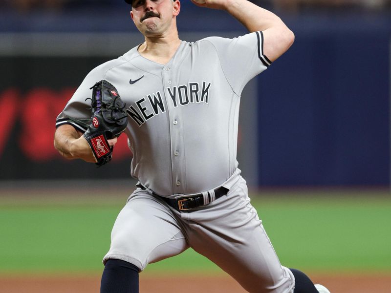 Aug 27, 2023; St. Petersburg, Florida, USA;  New York Yankees starting pitcher Carlos Rodon (55) throws a pitch against the Tampa Bay Rays in the first inning at Tropicana Field. Mandatory Credit: Nathan Ray Seebeck-USA TODAY Sports