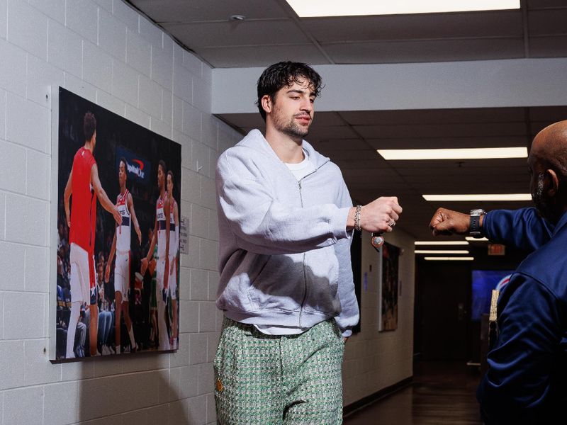 WASHINGTON, DC -? MARCH 23:  Deni Avdija #8 of the Washington Wizards arrives to the arena before the game on March 23, 2024 at Capital One Arena in Washington, DC. NOTE TO USER: User expressly acknowledges and agrees that, by downloading and or using this Photograph, user is consenting to the terms and conditions of the Getty Images License Agreement. Mandatory Copyright Notice: Copyright 2024 NBAE (Photo by Kenny Giarla/NBAE via Getty Images)