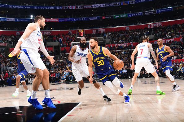 LOS ANGELES, CA - DECEMBER 14: Stephen Curry #30 of the Golden State Warriors dribbles the ball during the game against the LA Clippers on December 14, 2023 at Crypto.Com Arena in Los Angeles, California. NOTE TO USER: User expressly acknowledges and agrees that, by downloading and/or using this Photograph, user is consenting to the terms and conditions of the Getty Images License Agreement. Mandatory Copyright Notice: Copyright 2023 NBAE (Photo by Adam Pantozzi/NBAE via Getty Images)