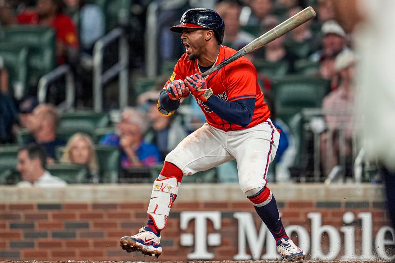 May 30, 2025; Cumberland, Georgia, USA; Atlanta Braves second baseman Ozzie Albies (1) reacts after being hit by a pitch against the Boston Red Sox during the seventh inning at Truist Park. Mandatory Credit: Dale Zanine-Imagn Images