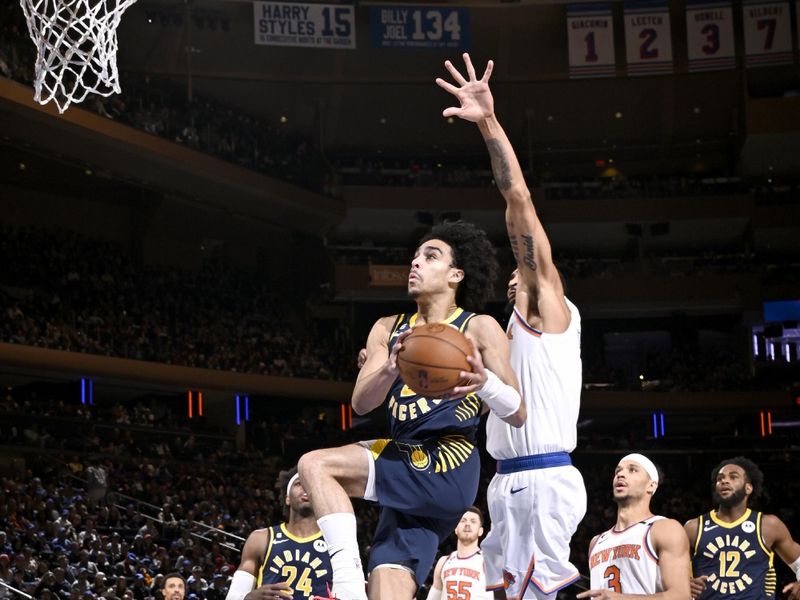 NEW YORK, NY - APRIL 9: Andrew Nembhard #2 of the Indiana Pacers drives to the basket during the game against the New York Knicks on April 9, 2023 at Madison Square Garden in New York City, New York. NOTE TO USER: User expressly acknowledges and agrees that, by downloading and or using this photograph, User is consenting to the terms and conditions of the Getty Images License Agreement. Mandatory Copyright Notice: Copyright 2023 NBAE  (Photo by David Dow/NBAE via Getty Images)