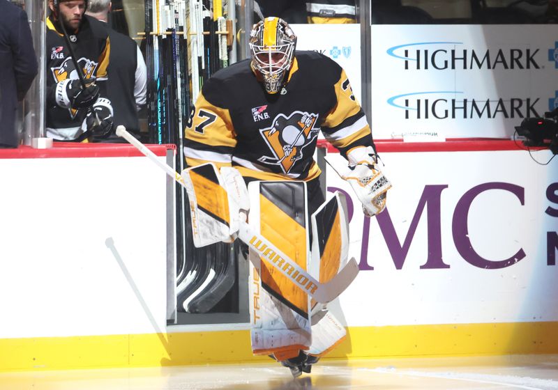 Oct 21, 2025; Pittsburgh, Pennsylvania, USA;  Pittsburgh Penguins goaltender Arturs Silovs (37) takes the ice to play the Vancouver Canucks at PPG Paints Arena. Mandatory Credit: Charles LeClaire-Imagn Images