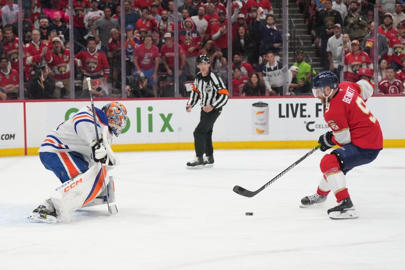 Jun 9, 2025; Sunrise, Florida, USA; Florida Panthers forward Sam Bennett (9) scores against Edmonton Oilers goaltender Stuart Skinner (74) during the second period in game three of the 2025 Stanley Cup Final at Amerant Bank Arena. Mandatory Credit: Jim Rassol-Imagn Images