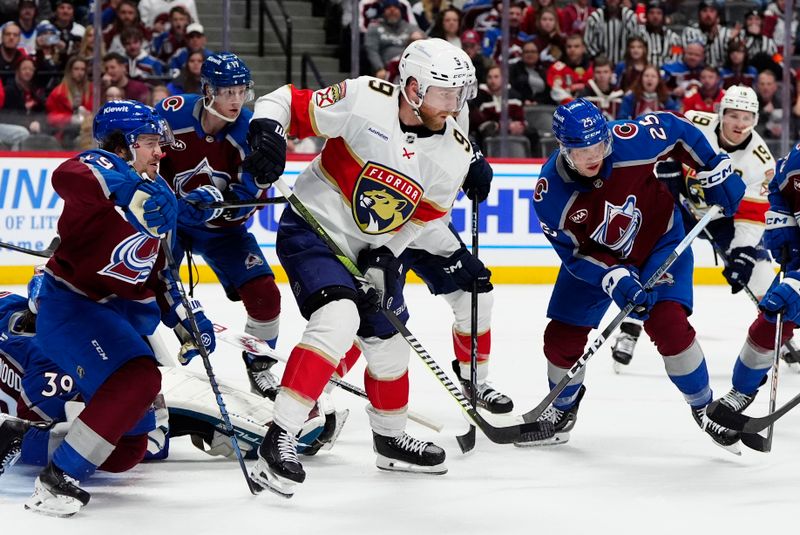 Jan 6, 2025; Denver, Colorado, USA; Florida Panthers center Sam Bennett (9) and Colorado Avalanche defenseman Samuel Girard (49) and right wing Logan O'Connor (25) during the third period at Ball Arena. Mandatory Credit: Ron Chenoy-Imagn Images