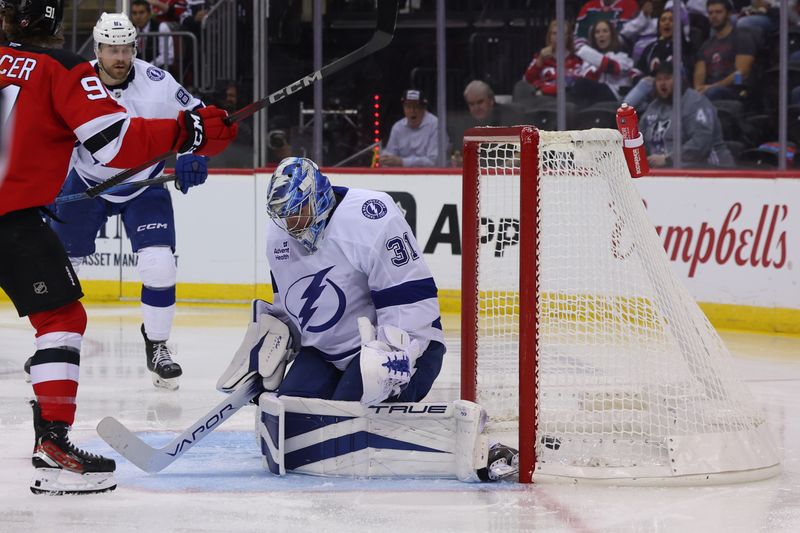 Oct 22, 2024; Newark, New Jersey, USA; New Jersey Devils right wing Timo Meier (not shown) scores a goal on Tampa Bay Lightning goaltender Jonas Johansson (31) during the second period at Prudential Center. Mandatory Credit: Ed Mulholland-Imagn Images