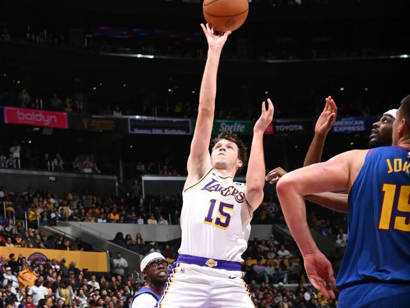 LOS ANGELES, CA - MARCH 2: Austin Reaves #15 of the Los Angeles Lakers shoots the ball during the game against the Denver Nuggets on March 2, 2024 at Crypto.Com Arena in Los Angeles, California. NOTE TO USER: User expressly acknowledges and agrees that, by downloading and/or using this Photograph, user is consenting to the terms and conditions of the Getty Images License Agreement. Mandatory Copyright Notice: Copyright 2024 NBAE (Photo by Andrew D. Bernstein/NBAE via Getty Images)