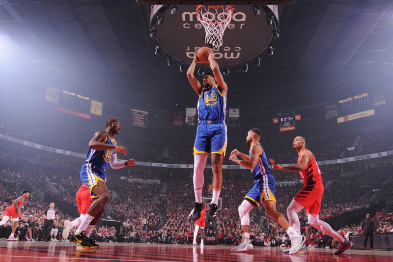 PORTLAND, OR - OCTOBER 23: Trayce Jackson-Davis #32 of the Golden State Warriors goes up for the rebound during the game against the Portland Trail Blazers on October 23, 2024 at the Moda Center Arena in Portland, Oregon. NOTE TO USER: User expressly acknowledges and agrees that, by downloading and or using this photograph, user is consenting to the terms and conditions of the Getty Images License Agreement. Mandatory Copyright Notice: Copyright 2024 NBAE (Photo by Cameron Browne/NBAE via Getty Images)