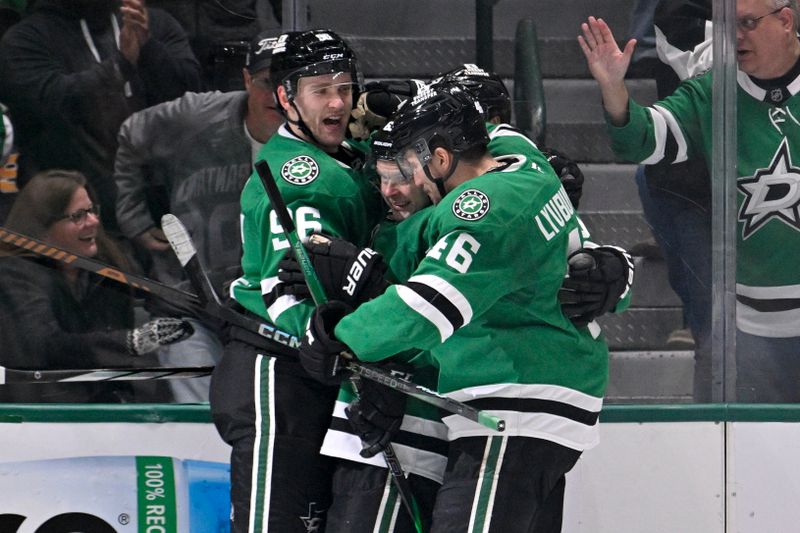 Apr 5, 2025; Dallas, Texas, USA; Dallas Stars right wing Mikko Rantanen (96) and right wing Evgenii Dadonov (63) and defenseman Ilya Lyubushkin (46) celebrate after Dadonov scores a goal for a hat trick against the Pittsburgh Penguins during the third period at the American Airlines Center. Mandatory Credit: Jerome Miron-Imagn Images
