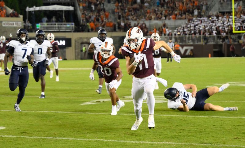 Sep 2, 2023; Blacksburg, Virginia, Virginia Tech Hokies wide receiver Tucker Holloway (11) returns an Old Dominion punt in the fourth quarter at Lane Stadium. Mandatory Credit: Lee Luther Jr.-USA TODAY Sports.