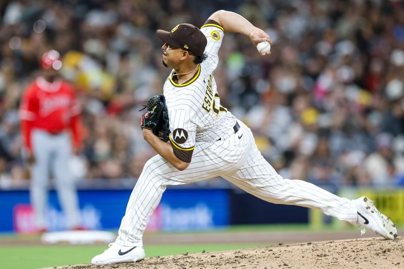 May 13, 2025; San Diego, California, USA; San Diego Padres relief pitcher Jeremiah Estrada (56) throws a pitch during the seventh inning against the Los Angeles Angels at Petco Park. Mandatory Credit: David Frerker-Imagn Images