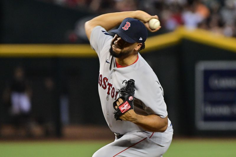 May 27, 2023; Phoenix, Arizona, USA;  Boston Red Sox relief pitcher Kenley Jansen (74) throws against the Arizona Diamondbacks in the ninth inning at Chase Field. Mandatory Credit: Matt Kartozian-USA TODAY Sports