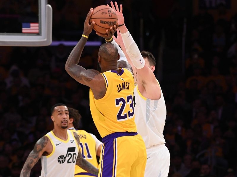 LOS ANGELES, CA - FEBRUARY 10: LeBron James #23 of the Los Angeles Lakers shoots the ball during the game against the Utah Jazz on February 10, 2025 at Crypto.Com Arena in Los Angeles, California. NOTE TO USER: User expressly acknowledges and agrees that, by downloading and/or using this Photograph, user is consenting to the terms and conditions of the Getty Images License Agreement. Mandatory Copyright Notice: Copyright 2025 NBAE (Photo by Juan Ocampo/NBAE via Getty Images)