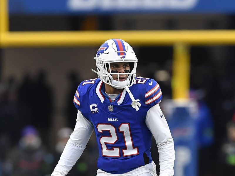 Buffalo Bills safety Jordan Poyer (21) runs on the field during the first half of an NFL football game against the New England Patriots in Orchard Park, N.Y., Sunday, Dec. 31, 2023. (AP Photo/Adrian Kraus)