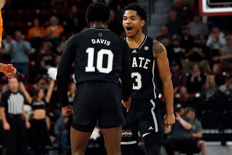 Jan 17, 2023; Starkville, Mississippi, USA; Mississippi State Bulldogs guard Shakeel Moore (3) reacts with Mississippi State Bulldogs guard Dashawn Davis (10) during the first half against the Tennessee Volunteers at Humphrey Coliseum. Mandatory Credit: Petre Thomas-USA TODAY Sports