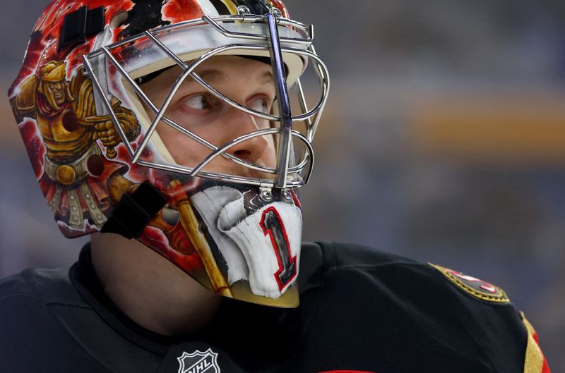 Oct 15, 2025; Buffalo, New York, USA;  Ottawa Senators goaltender Leevi Meriläinen (1) during a stoppage in play against the Buffalo Sabres at KeyBank Center. Mandatory Credit: Timothy T. Ludwig-Imagn Images