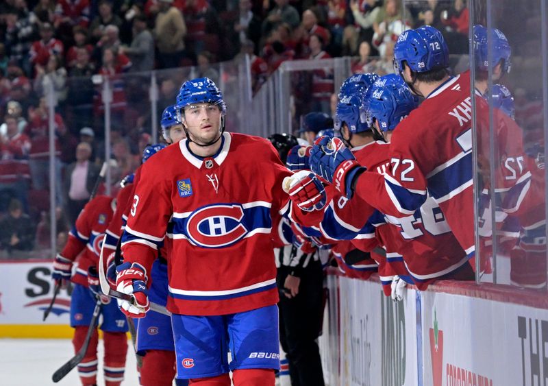 Oct 18, 2025; Montreal, Quebec, CAN; Montreal Canadiens defenseman Noah Dobson (53) celebrates with teammates after scoring a goal against the New York Rangers during the third period at the Bell Centre. Mandatory Credit: Eric Bolte-Imagn Images
