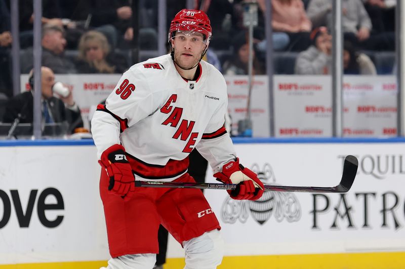 Jan 25, 2025; Elmont, New York, USA; Carolina Hurricanes right wing Mikko Rantanen (96) skates against the New York Islanders during the first period at UBS Arena. Mandatory Credit: Brad Penner-Imagn Images