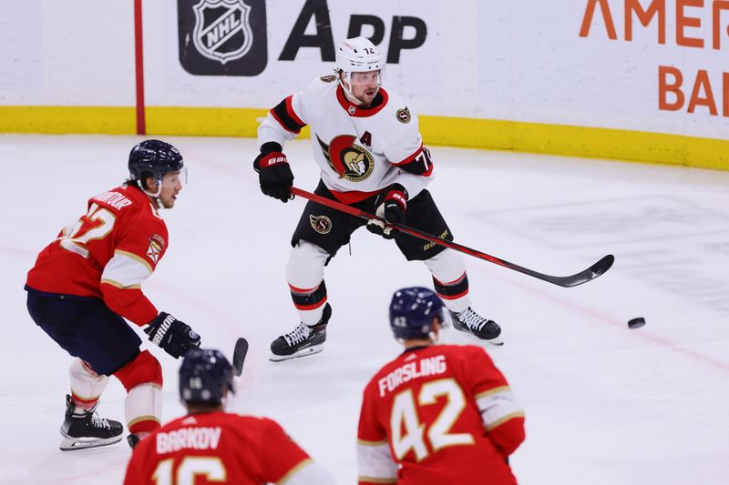 Apr 9, 2024; Sunrise, Florida, USA; Ottawa Senators defenseman Thomas Chabot (72) moves the puck against the Florida Panthers during the third period at Amerant Bank Arena. Mandatory Credit: Sam Navarro-USA TODAY Sports