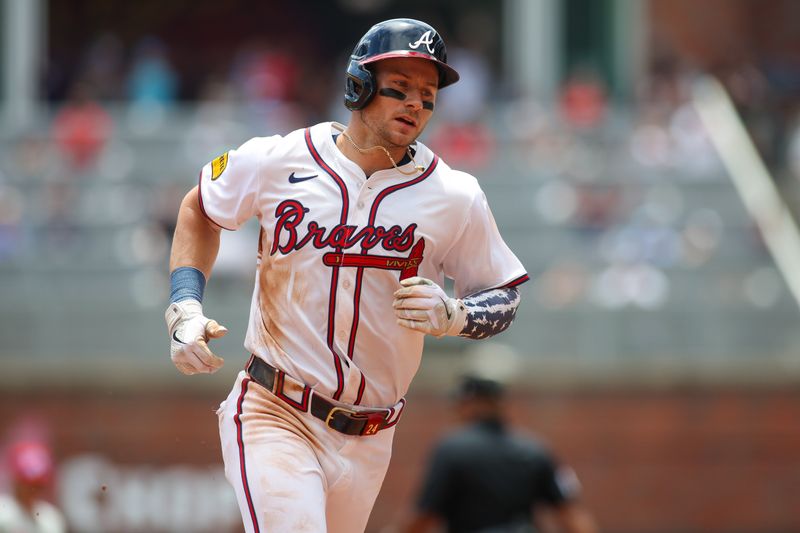 Jul 7, 2024; Atlanta, Georgia, USA; Atlanta Braves center fielder Jarred Kelenic (24) runs to third after a home run against the Philadelphia Phillies in the second inning at Truist Park. Mandatory Credit: Brett Davis-USA TODAY Sports
