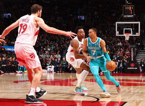 TORONTO, CANADA - DECEMBER 18:  Bryce McGowans #7 of the Charlotte Hornets handles the ball during the game against the Toronto Raptors on December 18, 2023 at the Scotiabank Arena in Toronto, Ontario, Canada.  NOTE TO USER: User expressly acknowledges and agrees that, by downloading and or using this Photograph, user is consenting to the terms and conditions of the Getty Images License Agreement.  Mandatory Copyright Notice: Copyright 2023 NBAE (Photo by Vaughn Ridley/NBAE via Getty Images)