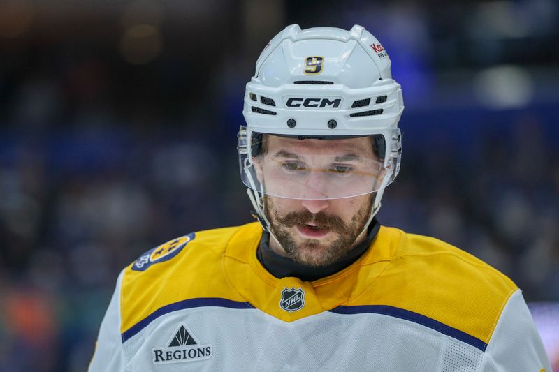 Mar 29, 2026; Tampa, Florida, USA; Nashville Predators left wing Filip Forsberg (9) looks on against the Tampa Bay Lightning in the first period at Benchmark International Arena. Mandatory Credit: Nathan Ray Seebeck-Imagn Images