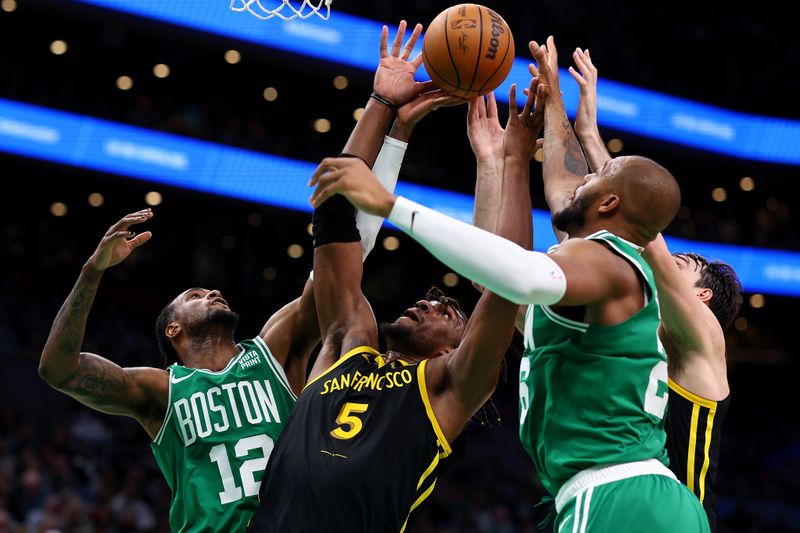 BOSTON, MASSACHUSETTS - MARCH 03: Kevon Looney #5 of the Golden State Warriors battles Oshae Brissett #12 of the Boston Celtics and Xavier Tillman #26 for a rebound during the second half at TD Garden on March 03, 2024 in Boston, Massachusetts. The Celtics defeat the Warriors 140-88. NOTE TO USER: User expressly acknowledges and agrees that, by downloading and or using this photograph, user is consenting to the terms and conditions of the Getty Images License Agreement.  (Photo by Maddie Meyer/Getty Images)