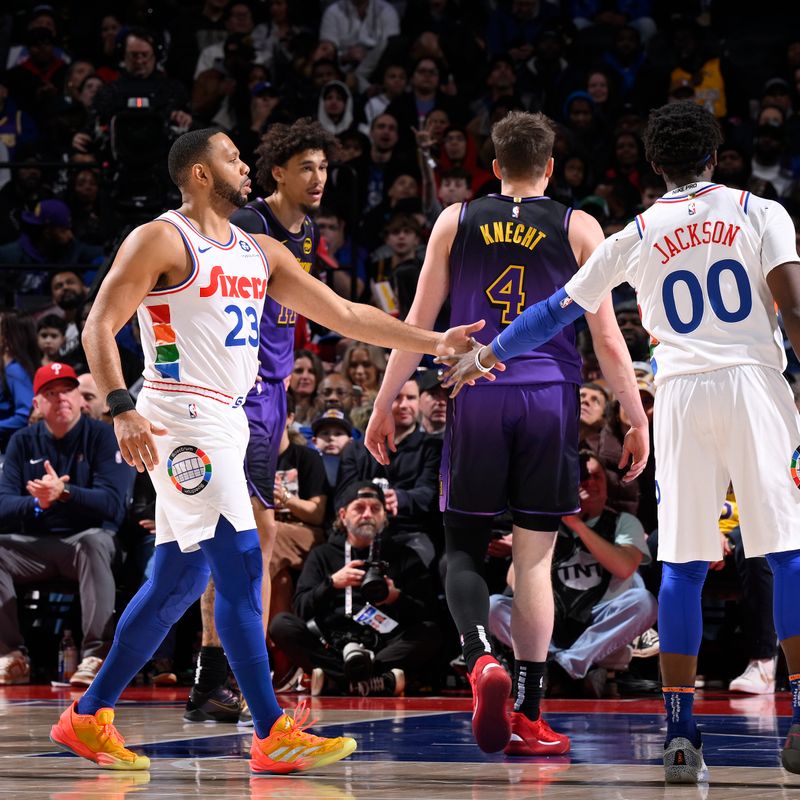 PHILADELPHIA, PA - JANUARY 28: Eric Gordon #23 and Reggie Jackson #00 of the Philadelphia 76ers high five during the game against the Los Angeles Lakers on January 28, 2025 at the Wells Fargo Center in Philadelphia, Pennsylvania NOTE TO USER: User expressly acknowledges and agrees that, by downloading and/or using this Photograph, user is consenting to the terms and conditions of the Getty Images License Agreement. Mandatory Copyright Notice: Copyright 2025 NBAE (Photo by David Dow/NBAE via Getty Images)