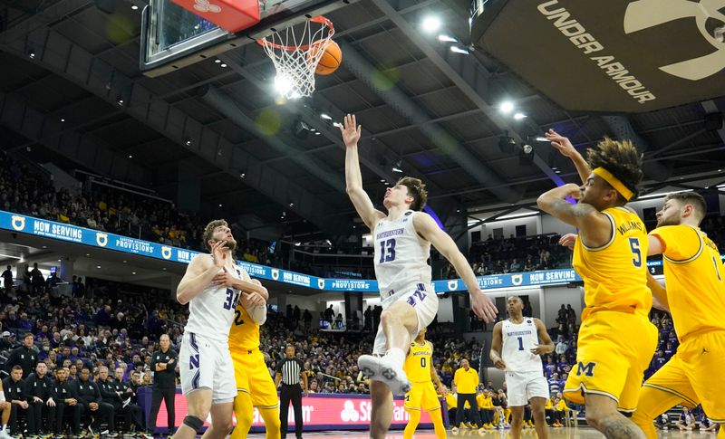 Feb 2, 2023; Evanston, Illinois, USA; Northwestern Wildcats guard Brooks Barnhizer (13) shoots against the Michigan Wolverines during the second half at Welsh-Ryan Arena. Mandatory Credit: David Banks-USA TODAY Sports