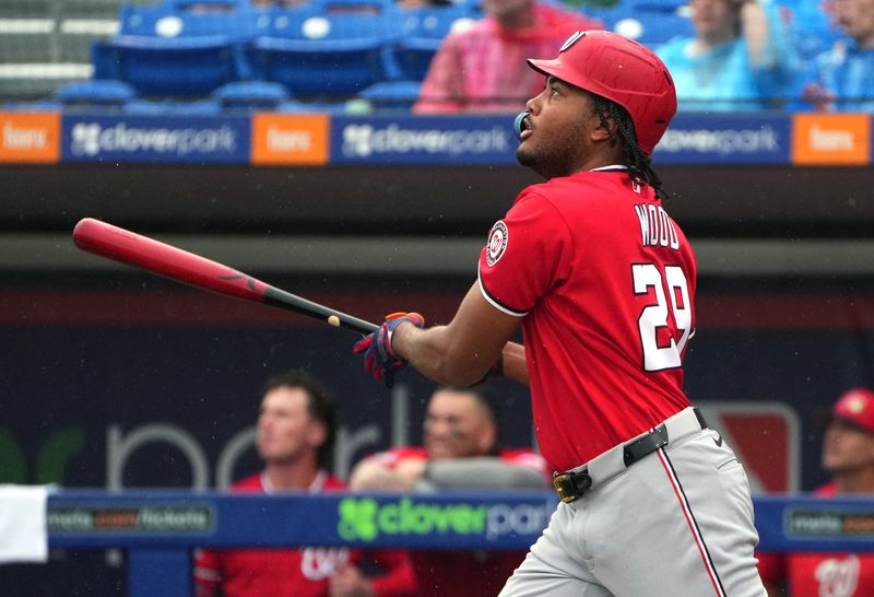 Feb 28, 2026; Port St. Lucie, Florida, USA;  Washington Nationals left fielder James Wood (29) flies out to deep center field in the first inning against the New York Mets at Clover Park. Mandatory Credit: Jim Rassol-Imagn Images