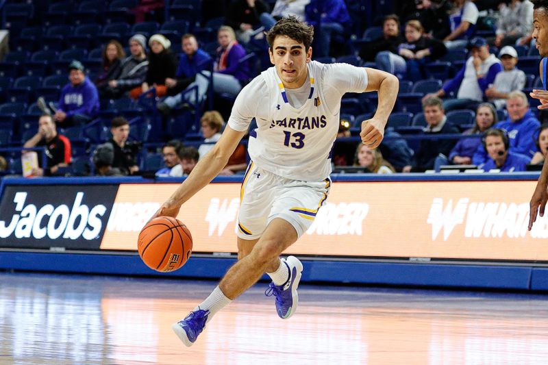 Jan 13, 2024; Colorado Springs, Colorado, USA; San Jose State Spartans guard Alvaro Cardenas (13) drives up the lane in the first half against the Air Force Falcons at Clune Arena. Mandatory Credit: Isaiah J. Downing-USA TODAY Sports