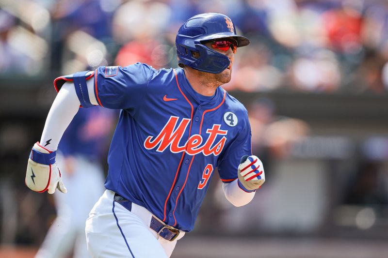 Jun 2, 2024; New York City, New York, USA; New York Mets left fielder Brandon Nimmo (9) hits an two-RBI triple during the third inning against the Arizona Diamondbacks at Citi Field. Mandatory Credit: Vincent Carchietta-USA TODAY Sports