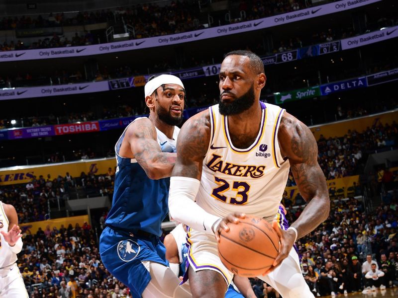 LOS ANGELES, CA - MARCH 10: LeBron James #23 of the Los Angeles Lakers drives to the basket during the game against the Minnesota Timberwolves on March 10, 2024 at Crypto.Com Arena in Los Angeles, California. NOTE TO USER: User expressly acknowledges and agrees that, by downloading and/or using this Photograph, user is consenting to the terms and conditions of the Getty Images License Agreement. Mandatory Copyright Notice: Copyright 2024 NBAE (Photo by Adam Pantozzi/NBAE via Getty Images)