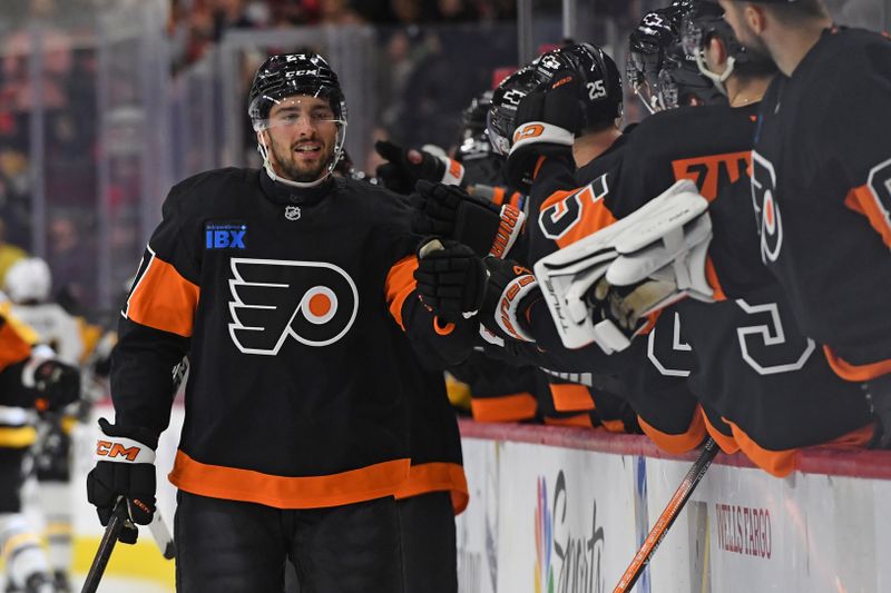 Feb 25, 2025; Philadelphia, Pennsylvania, USA; Philadelphia Flyers left wing Noah Cates (27) celebrates his goal with teammates against the Pittsburgh Penguins during the first period at Wells Fargo Center. Mandatory Credit: Eric Hartline-Imagn Images