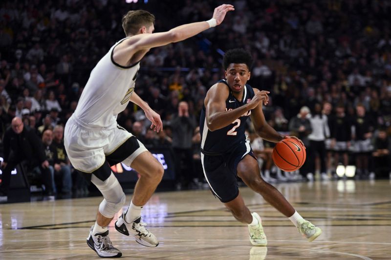 Jan 21, 2023; Winston-Salem, North Carolina, USA;  Virginia Cavaliers guard Reece Beekman (2) drives against Wake Forest Demon Deacons forward Andrew Carr (11) during the second half at Lawrence Joel Veterans Memorial Coliseum. Mandatory Credit: William Howard-USA TODAY Sports