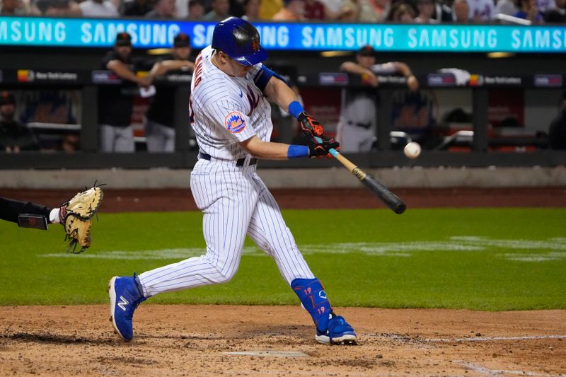 Jul 2, 2023; New York City, New York, USA; New York Mets Mark Canha (19) hits a single against the San Francisco Giants during the fifth inning at Citi Field. Mandatory Credit: Gregory Fisher-USA TODAY Sports