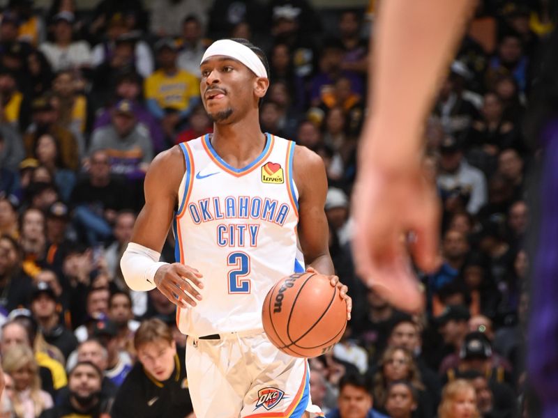 LOS ANGELES, CA - JANUARY 15:  Shai Gilgeous-Alexander #2 of the Oklahoma City Thunder handles the ball during the game  on January 15, 2024 at Crypto.Com Arena in Los Angeles, California. NOTE TO USER: User expressly acknowledges and agrees that, by downloading and/or using this Photograph, user is consenting to the terms and conditions of the Getty Images License Agreement. Mandatory Copyright Notice: Copyright 2024 NBAE (Photo by Andrew D. Bernstein/NBAE via Getty Images)