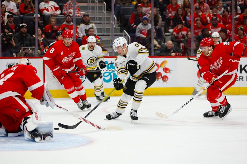 Dec 31, 2023; Detroit, Michigan, USA; Boston Bruins center Morgan Geekie (39) takes a shot on Detroit Red Wings goaltender Alex Lyon (34) during the first period of the game between the Boston Bruins and the Detroit Red Wings at Little Caesars Arena. Mandatory Credit: Brian Bradshaw Sevald-USA TODAY Sports